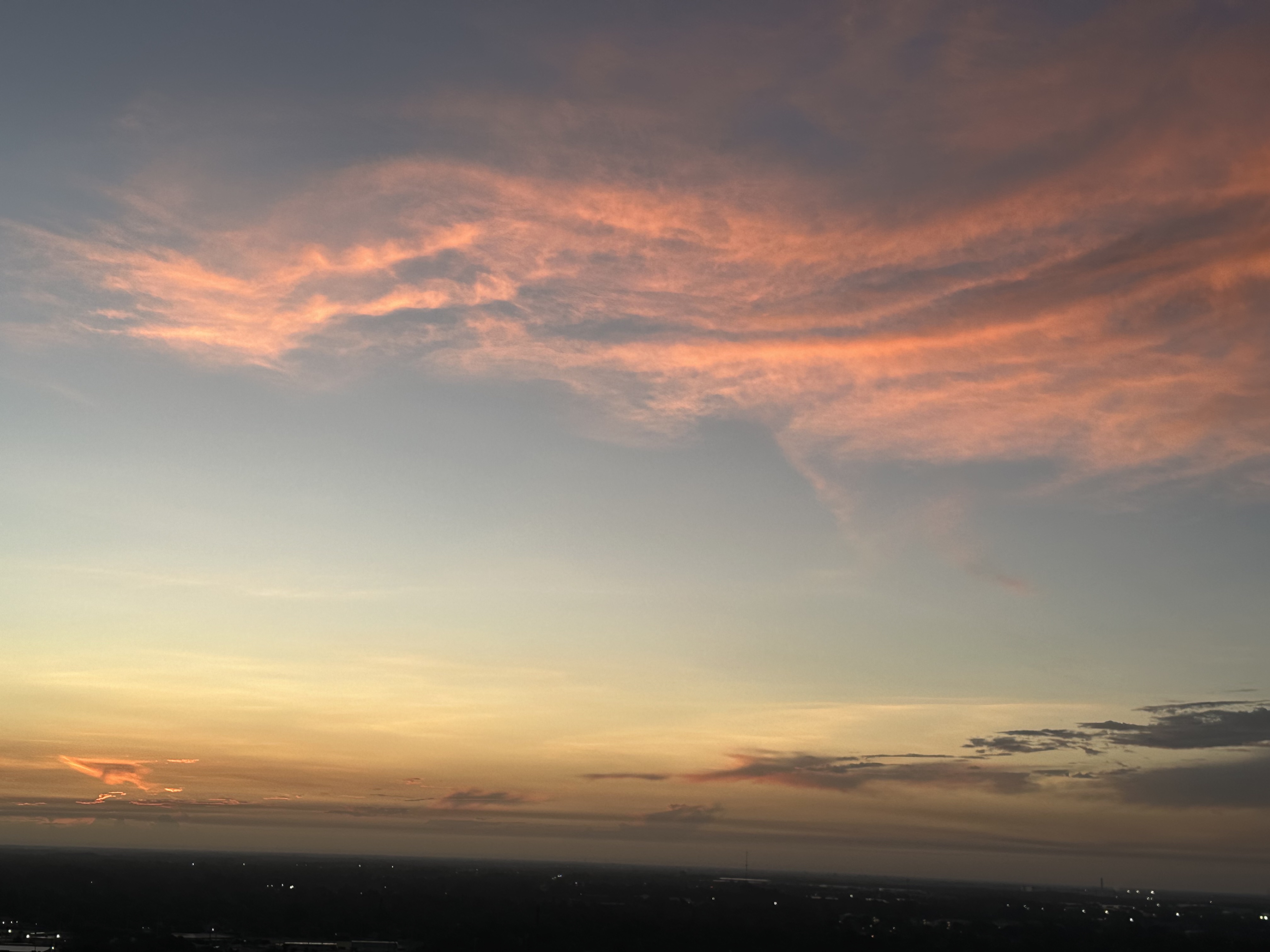 Long finger clouds grab pink from the not yet risen sun.